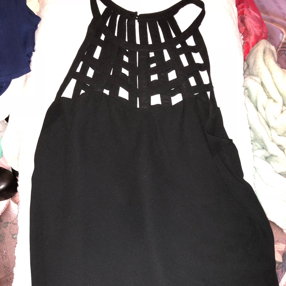 Francesca’s black flowy tank